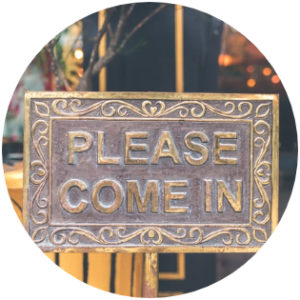 A sign that says please come in 